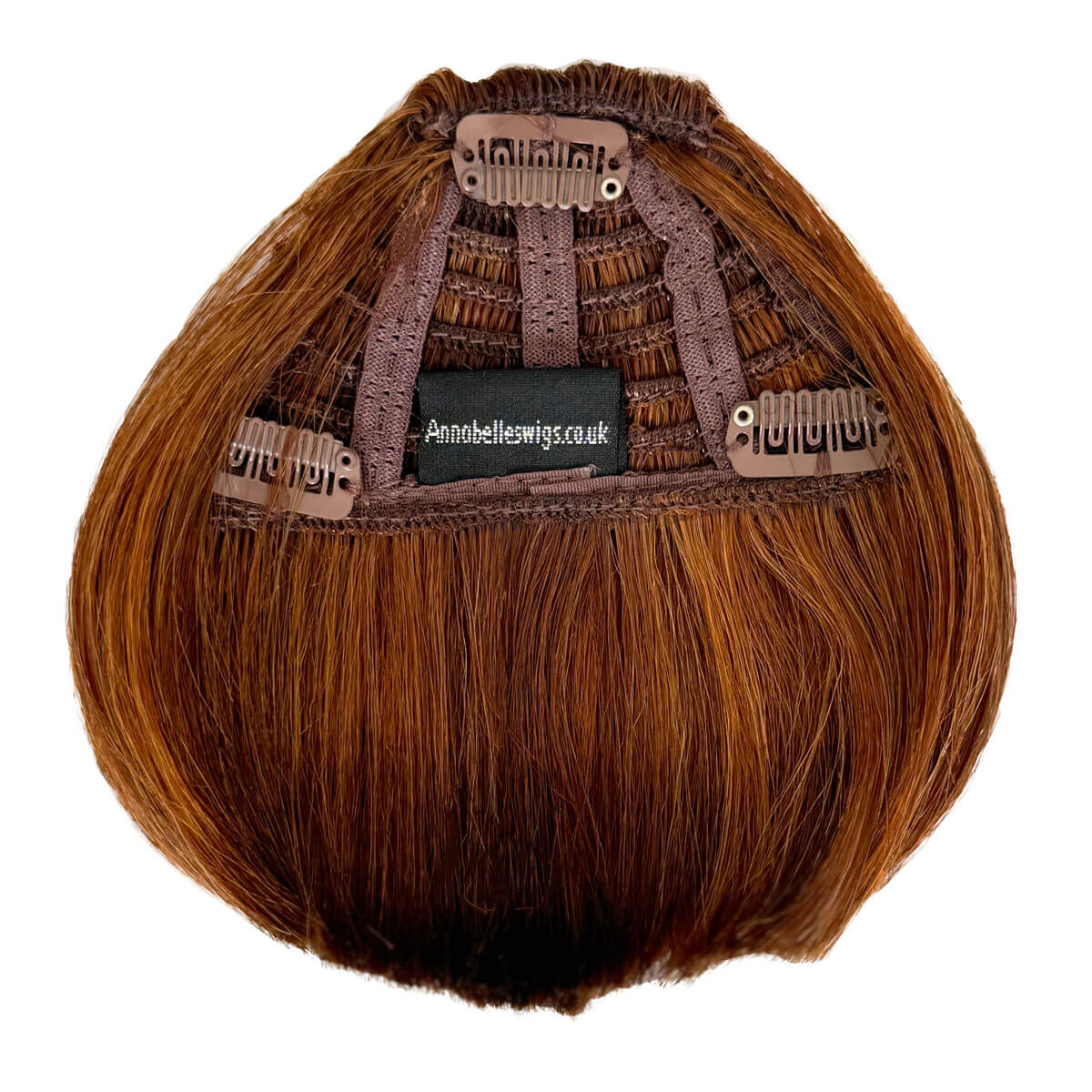 Brown hair extension with clip mechanism on a white background. Clip-in fringe hairpiece/clip-in micro-bangs, thick, straight retro rockabilly style: Ida auburn BO