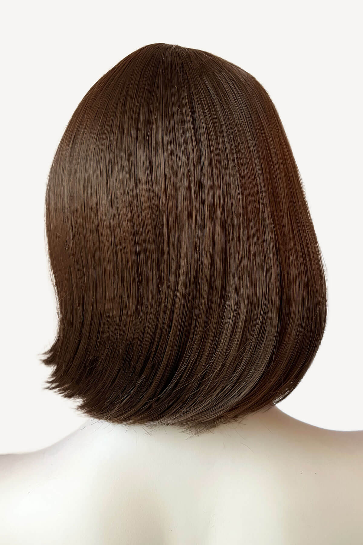 Back view of a person with a straight brown bob haircut on a white background. Brown bob wig, chic and stylish: Honour mocha brown 10