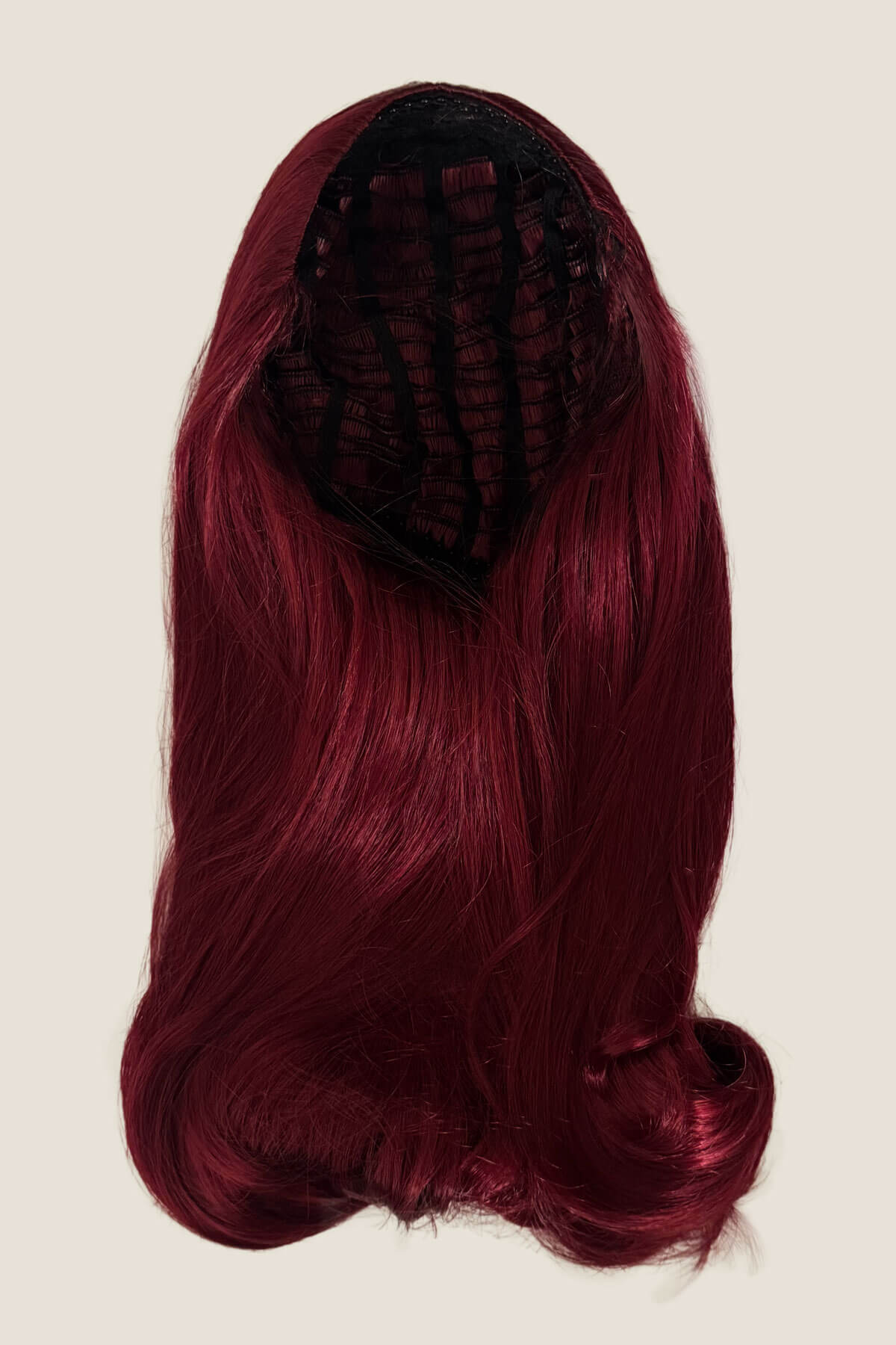 Red wig on a white background. 1960s Retro high crown, half wig hairpiece, long with hair flip: Priscilla cherry red 39