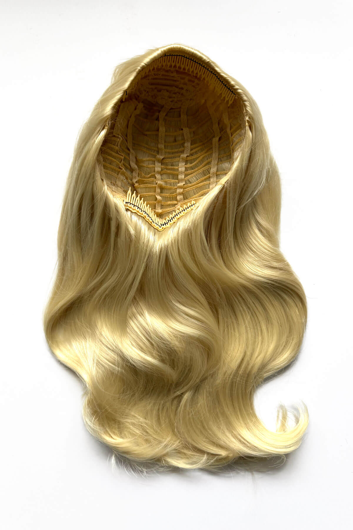 Blonde hair extension on a white background. Half wig hairpiece, long and wavy, Flexihair (Heat styleable) and volume ring for high crown: Sharon creamy blonde 613