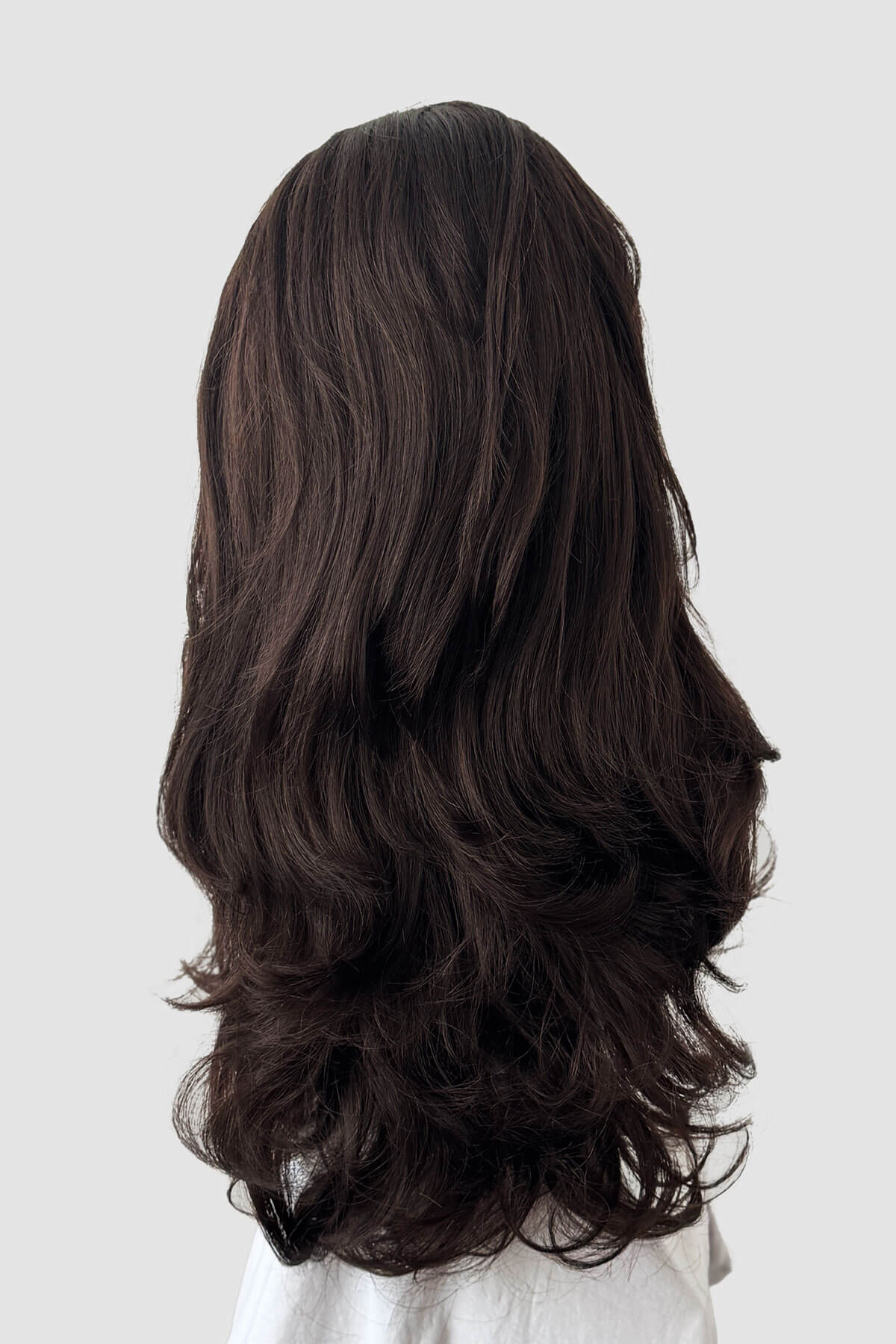 Long brown wig on a mannequin head against a white background. Chelsea - Super Full Volume, Extra Long Loose Curls Brown Half Wig dark chocolate brown 6
