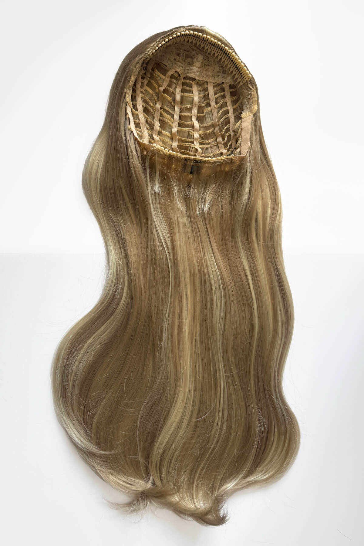 Ash blonde half wig on a plain background. Kate - Heat Styleable Extra Long, Gentle Wave Half Wig blonde 24H613