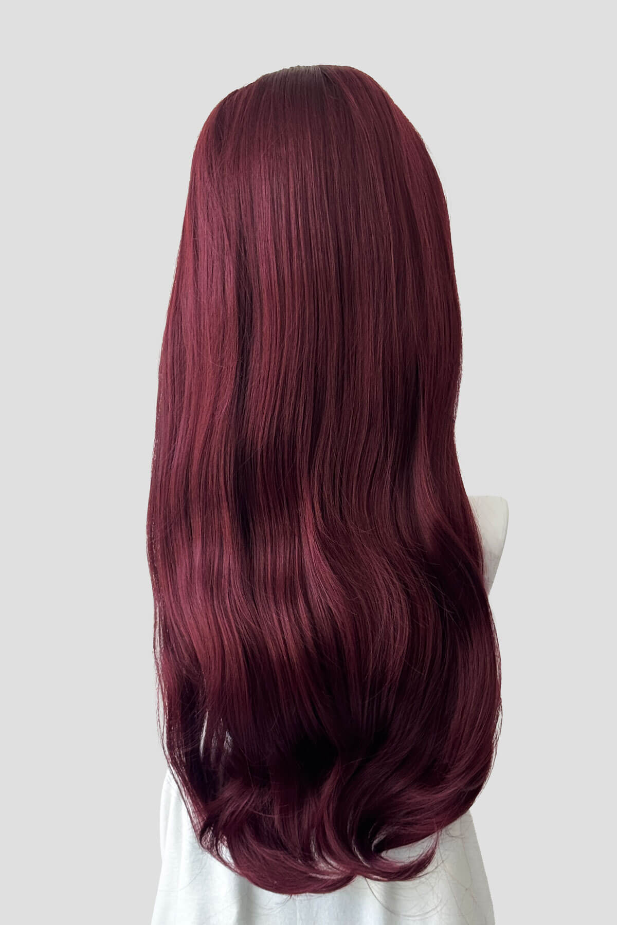 Mannequin head with long, wavy, burgundy hair on a plain background. Kate - Heat Styleable Extra Long, Gentle Wave Half Wig red 39
