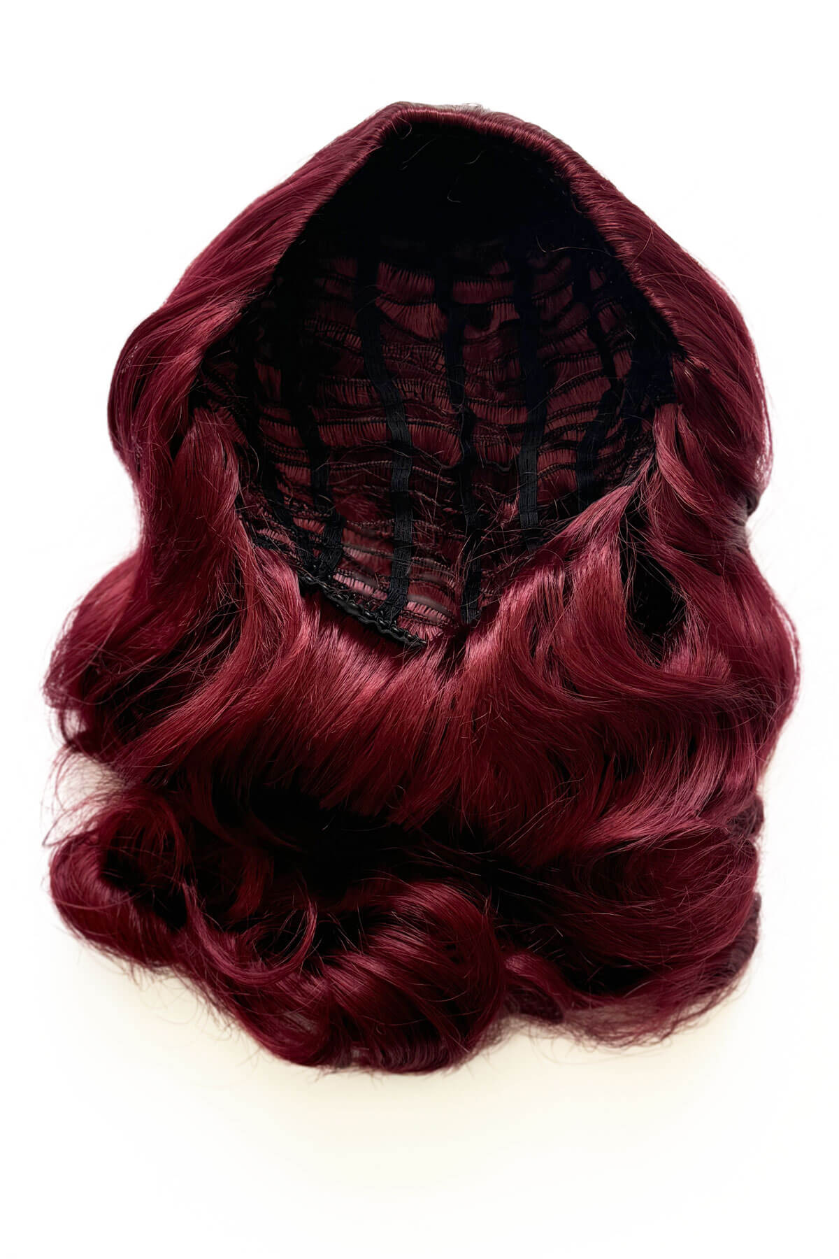 Red wig with a white background. 1950s style shoulder length half wig hairpiece with beautiful vintage waves: Onyx cherry red 39