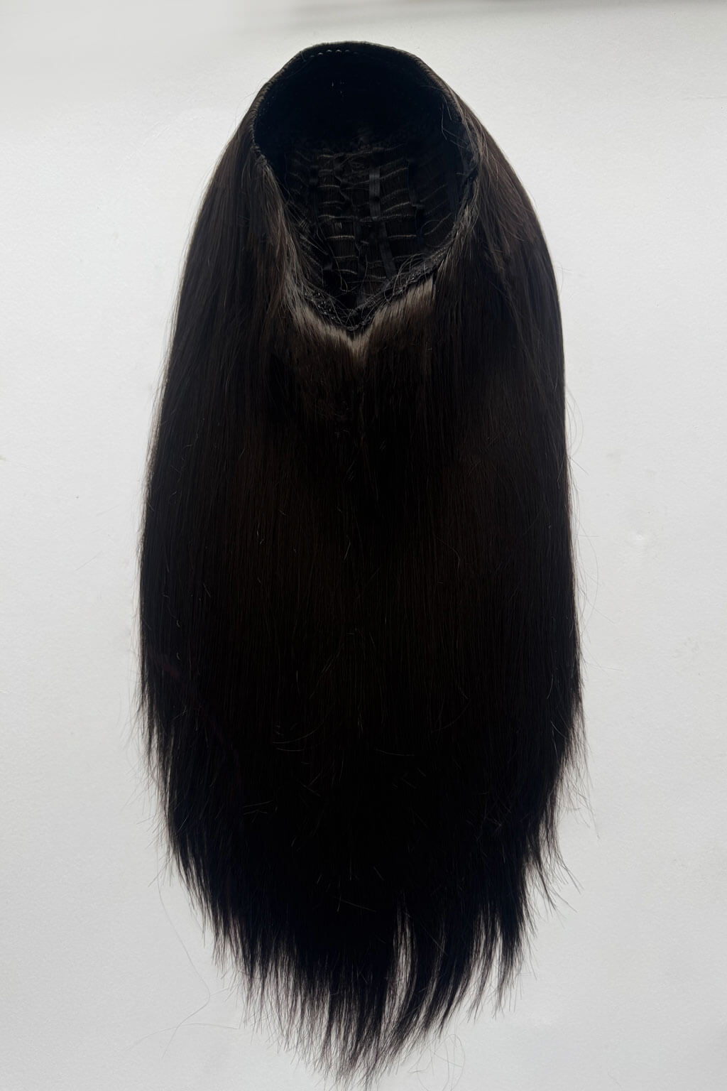 Dark brown hair extension on a white background. 1960s style hair, high crown long straight half wig: Andrea Dark brown 4