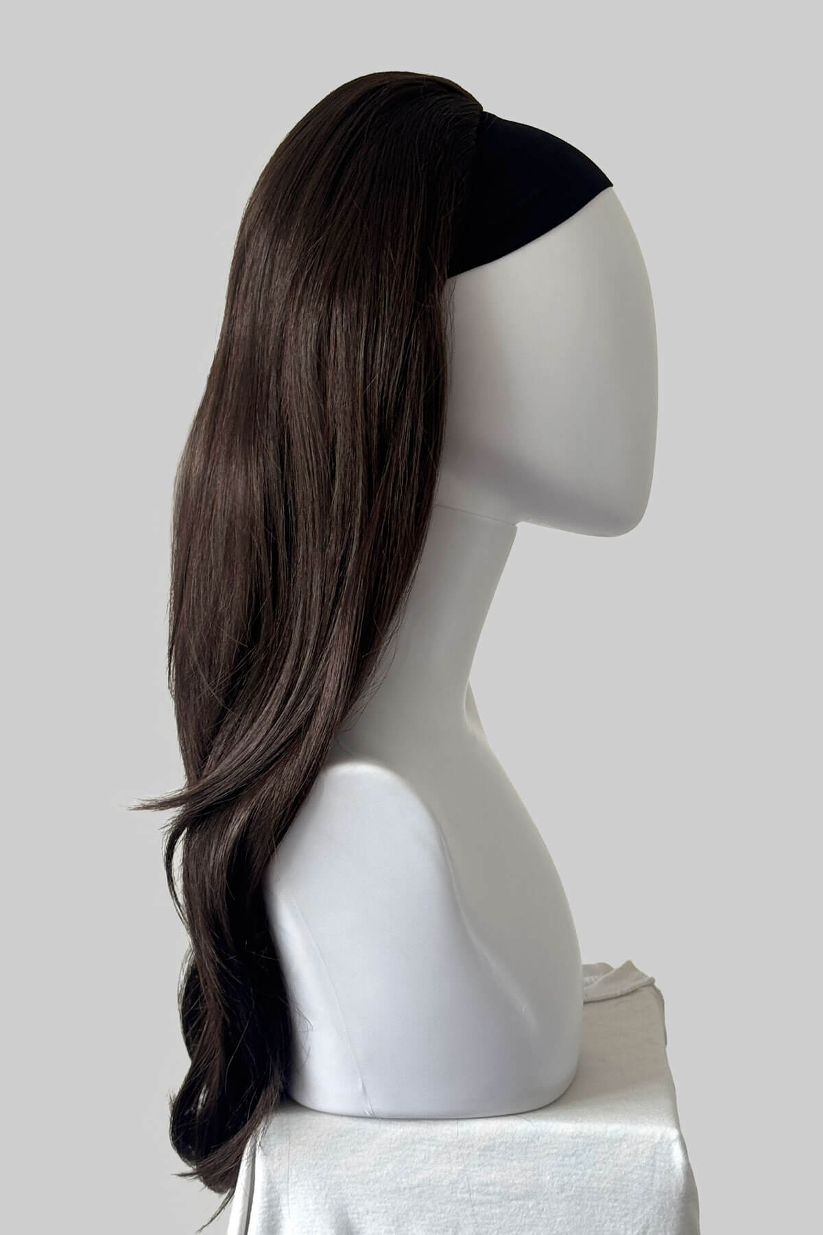 A long dark reddish brown half wig, displayed on a mannequin against a light grey background. Claudia - Volume Boosting Long Gentle Bouncy Layered Half wig dark reddish brown 6-33