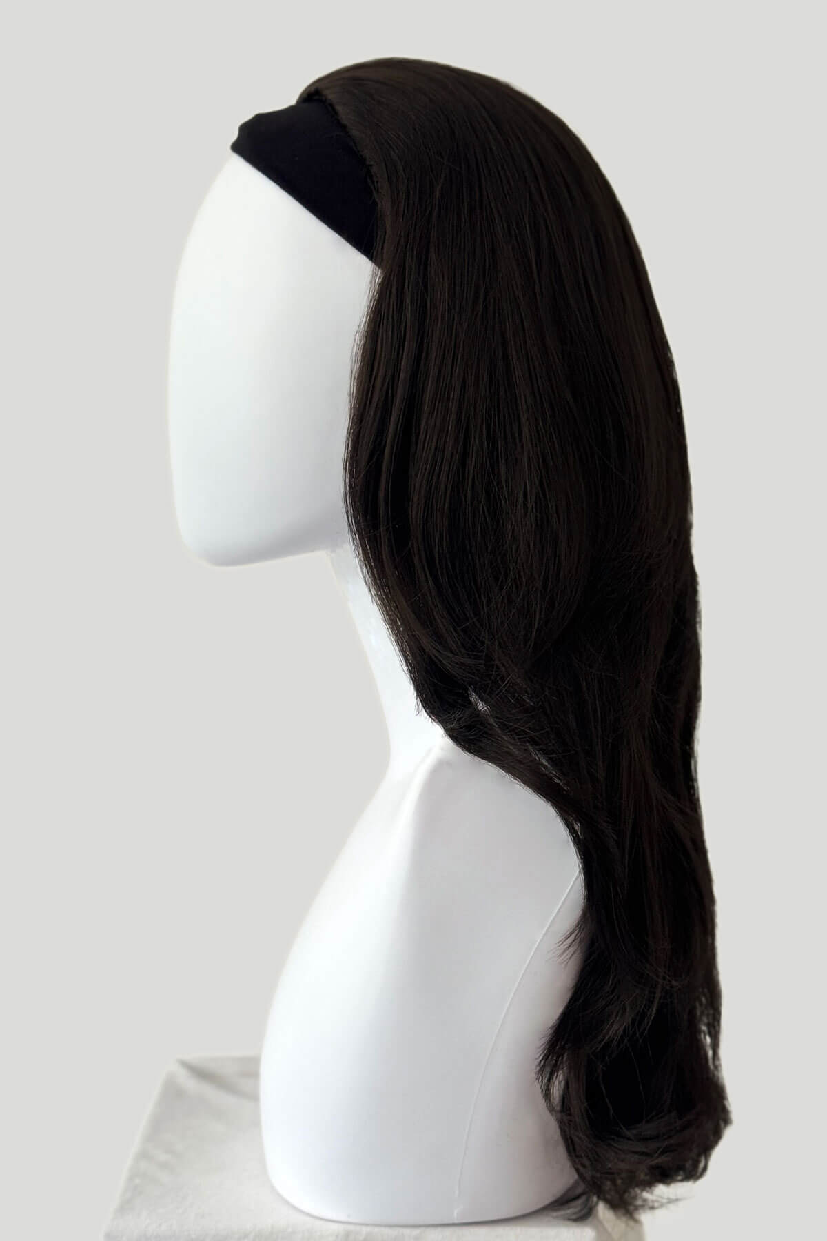 Dark brown wig on a mannequin head against a white background. Brown half wig hairpiece, layered and straight: Summer dark brown 4