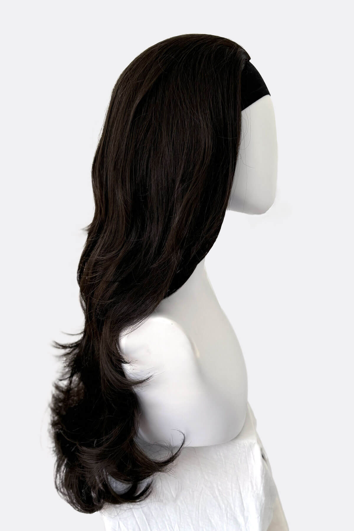 Black wig on a mannequin head against a white background. Brown half wig hairpiece (3/4 wig), layered, wavy: Simone dark brown 4