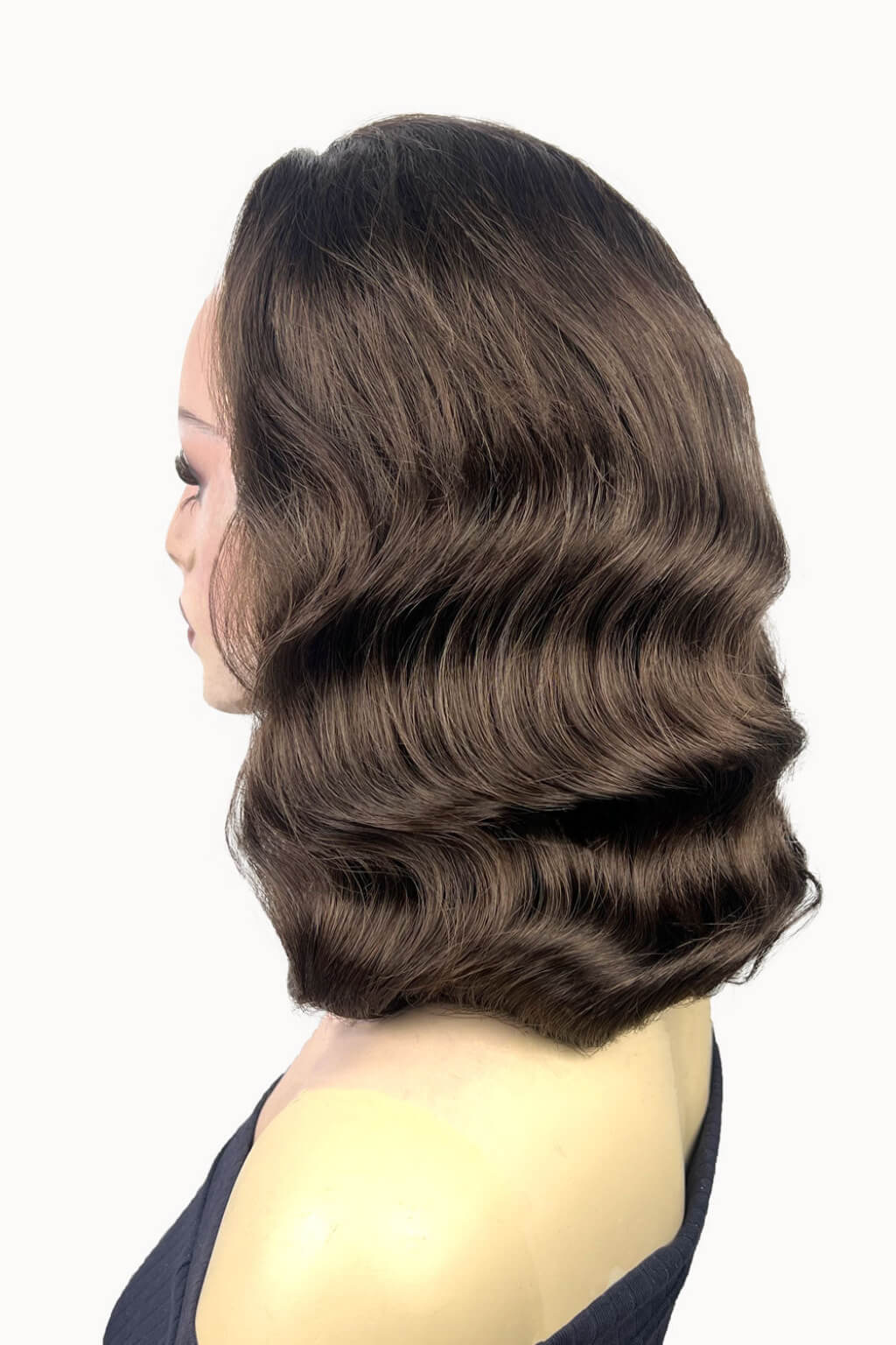 Mannequin head with brown hair styled in loose waves on a white background. 1950s style half wig hairpiece with deep finger waves: Deborah brown 8