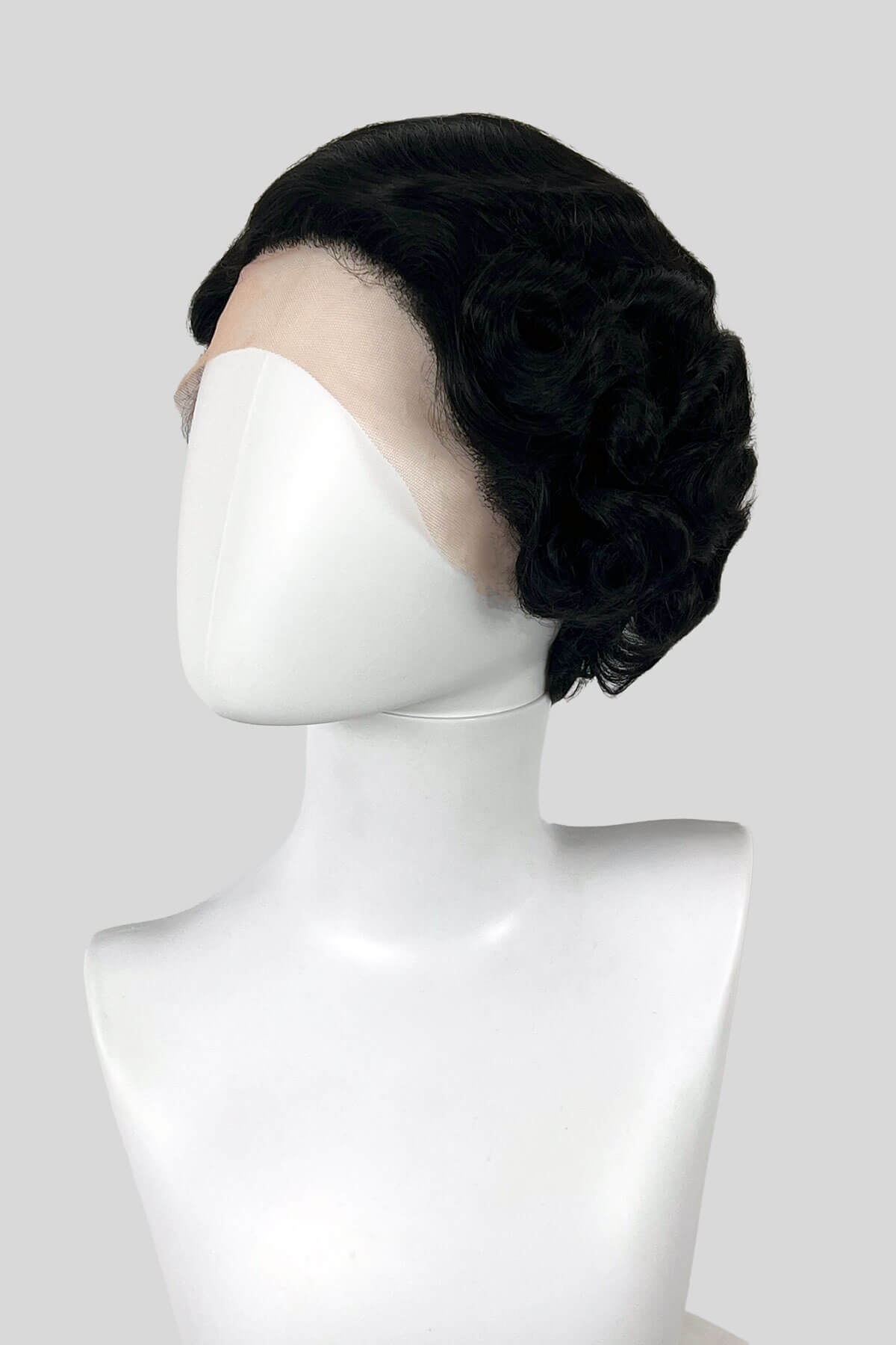 Black wig on a mannequin head against a white background. Black lacefront wig, pinup/vintage style, short with finger waves: Viola