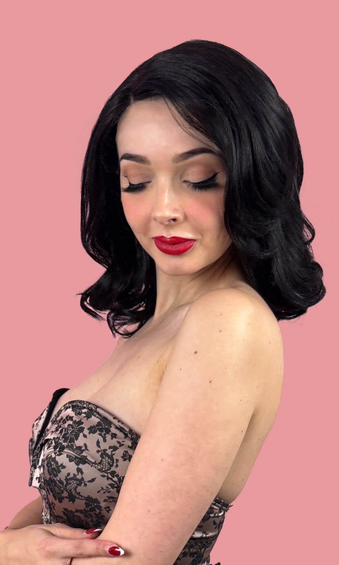 Woman with beautiful black hair. Black shoulder length long bob (lob) lace front wig with side sweeping fringe/bangs: Amaris