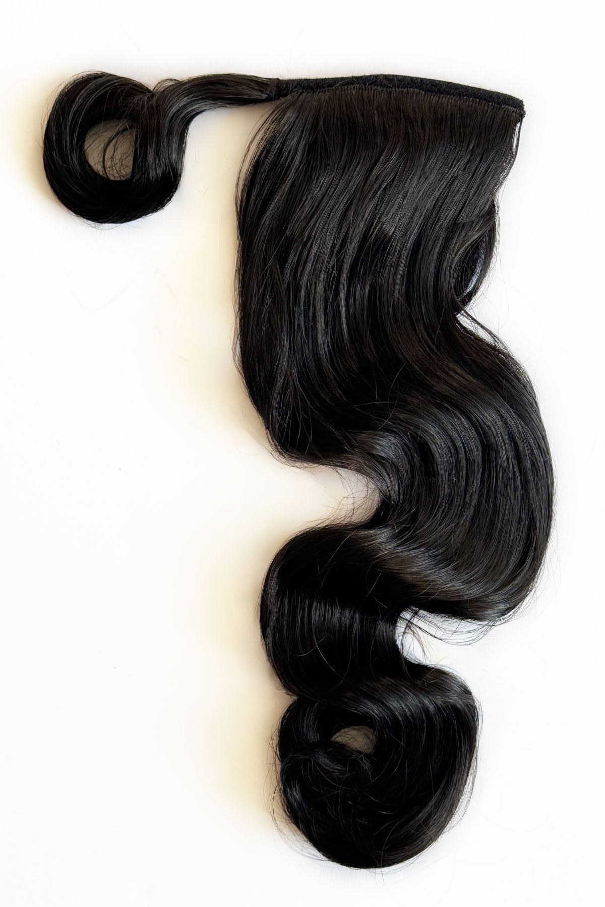 Black hair piece on a white background. Long ponytail hairpiece with vintage waves: Kitrysha - Black 1B