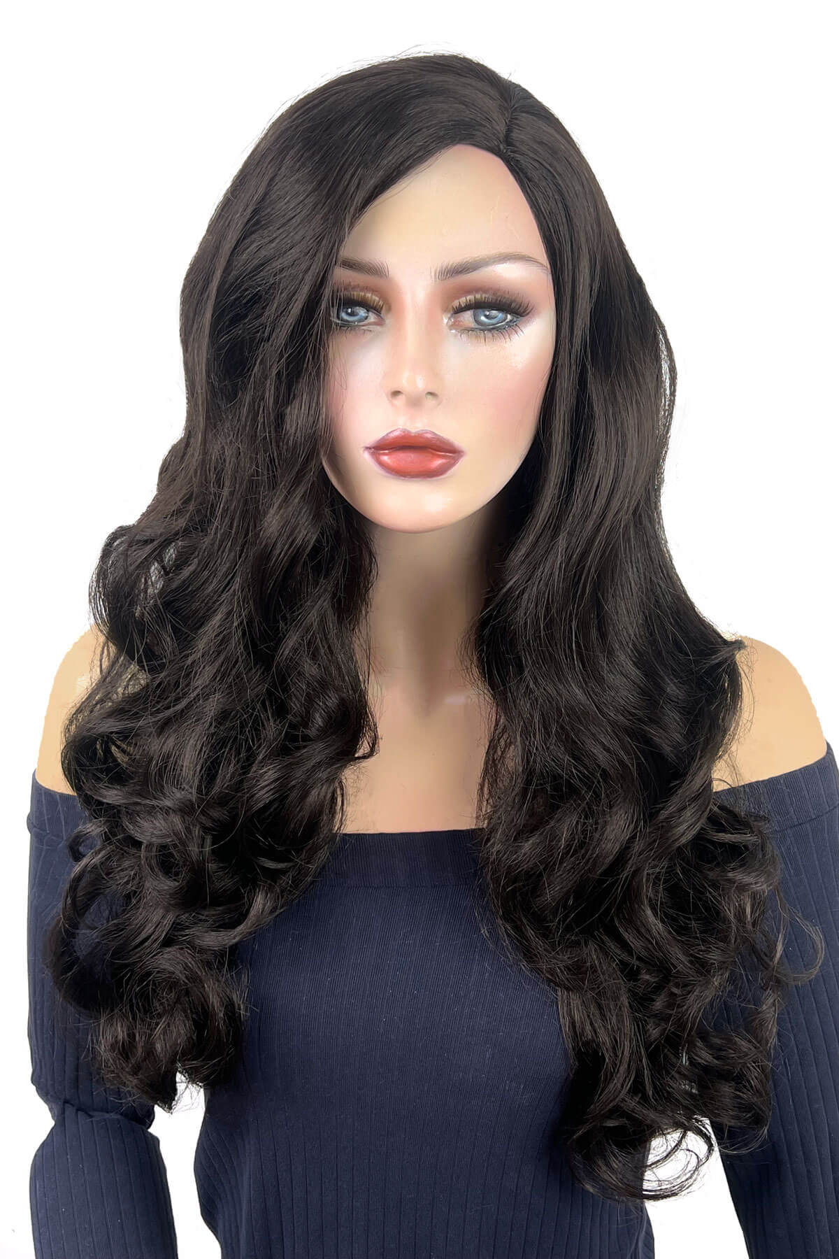 Mannequin head with long black wig on a white background. Long, brown wig, with wonderful loose waves and curls and a sweeping fringe: Leonie