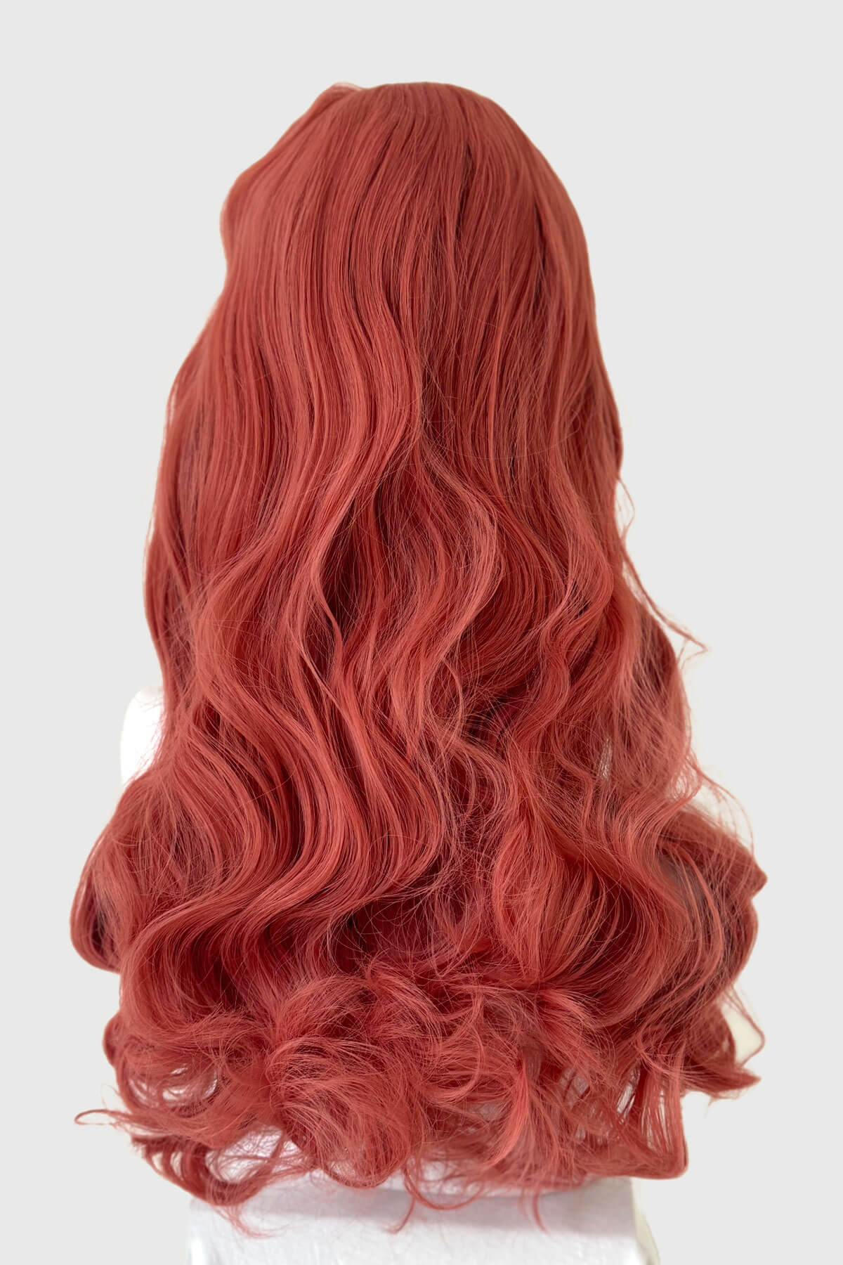 Long pastel-pink pinup style wig with gentle waves and short fringe: Candy