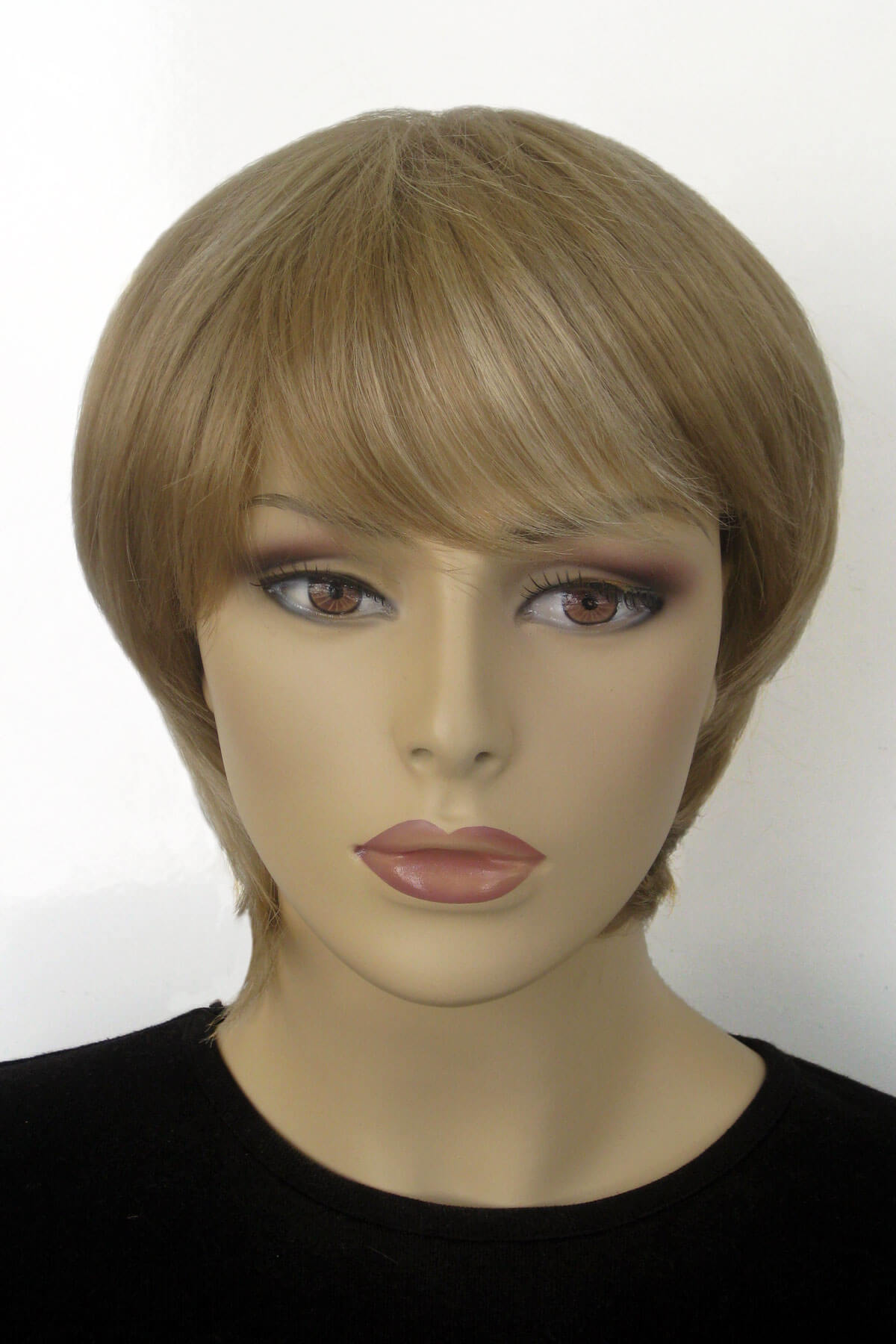 Mannequin head with a light brown wig on a white background. Pixie cut wig, layered and short: Sophia