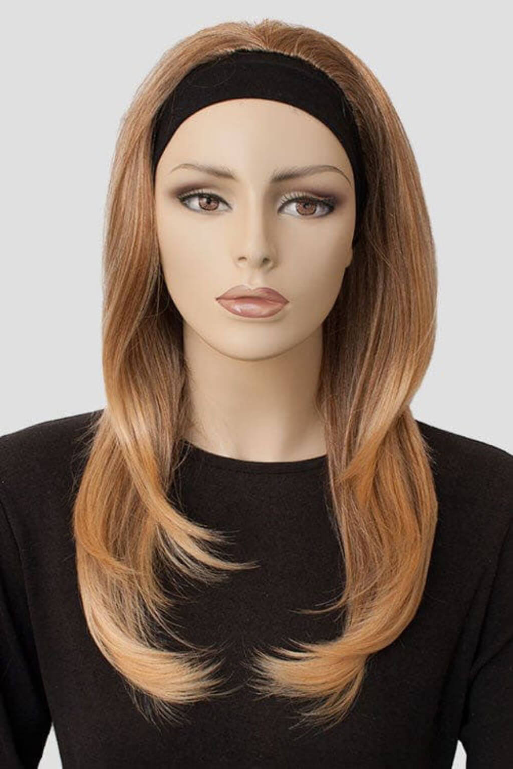 Mannequin head with a brown wig on a white background. Brown half wig hairpiece (3/4 wig), gently layered: Briar