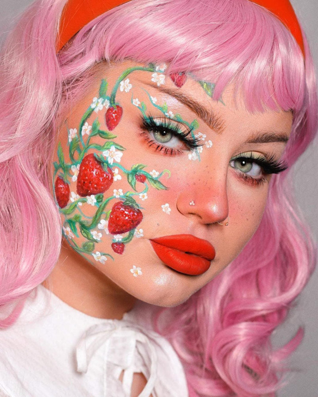 Pink pinup style wig, with finger waves and a short fringe, 1950s style: Stevie