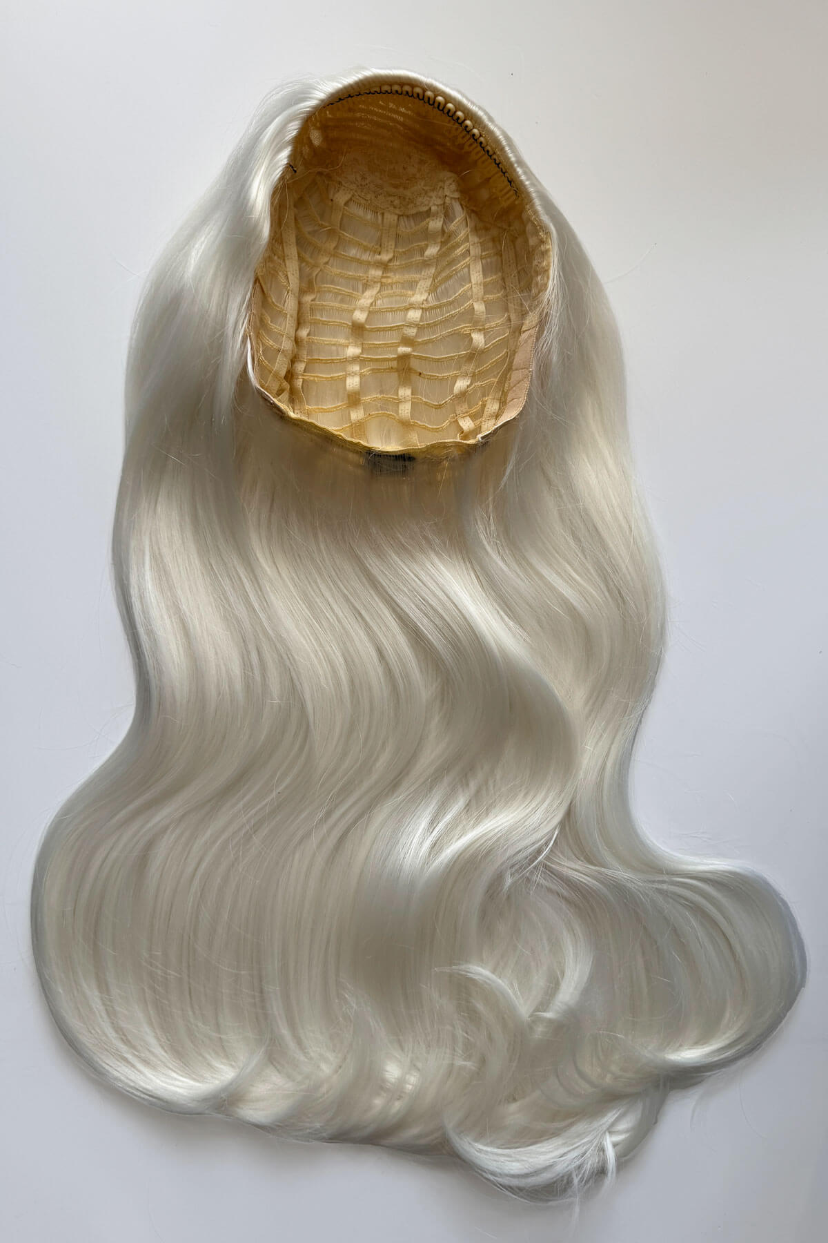 Long, platinum blonde half wig. Kate - Heat Styleable Extra Long, Gentle Wave Half Wig  dark platinum blonde 1001