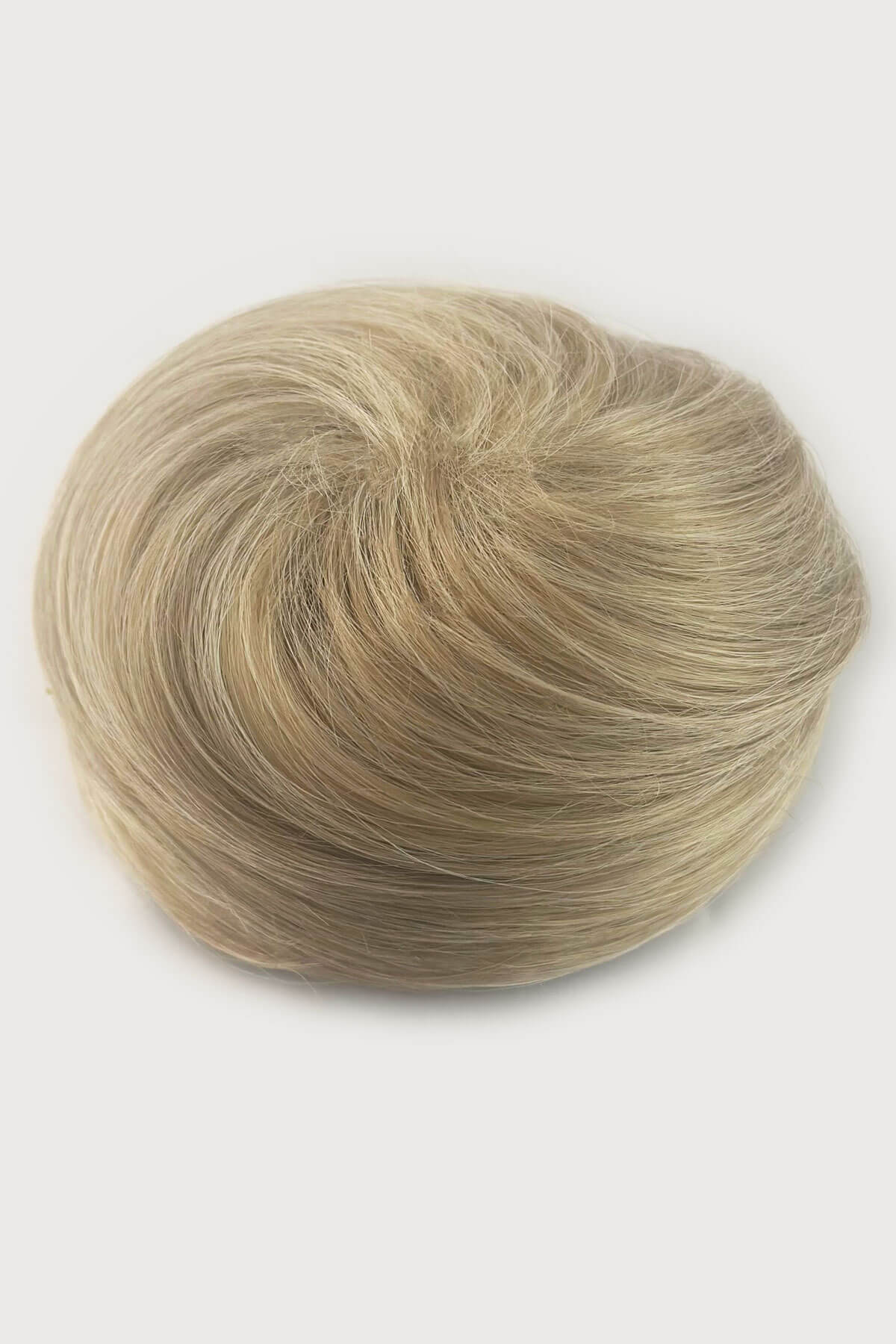 Light blonde hair bun on a white background. Hairpiece bun; instant perfect bun hairpiece: Hepburn blonde 613T24