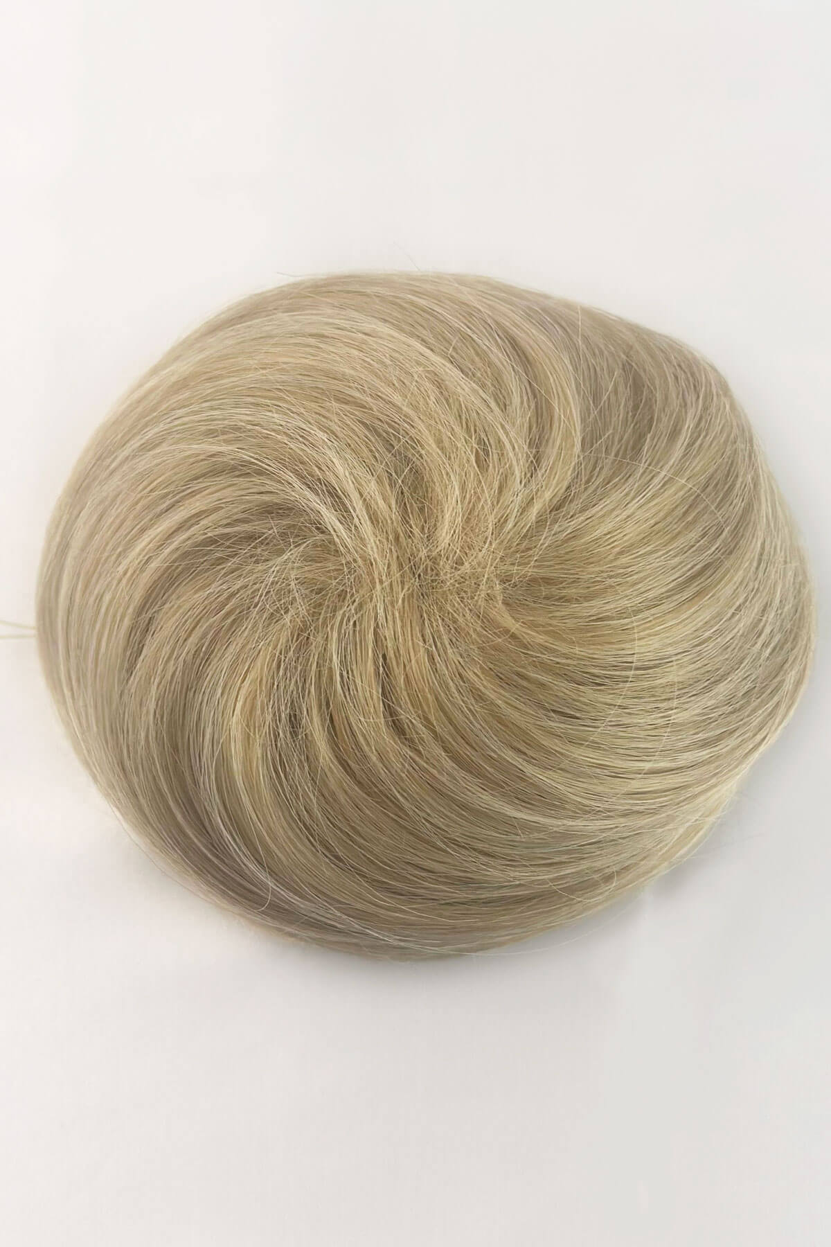 Light blonde hair bun on a white background. Hairpiece bun; instant perfect bun hairpiece: Hepburn blonde 613T24