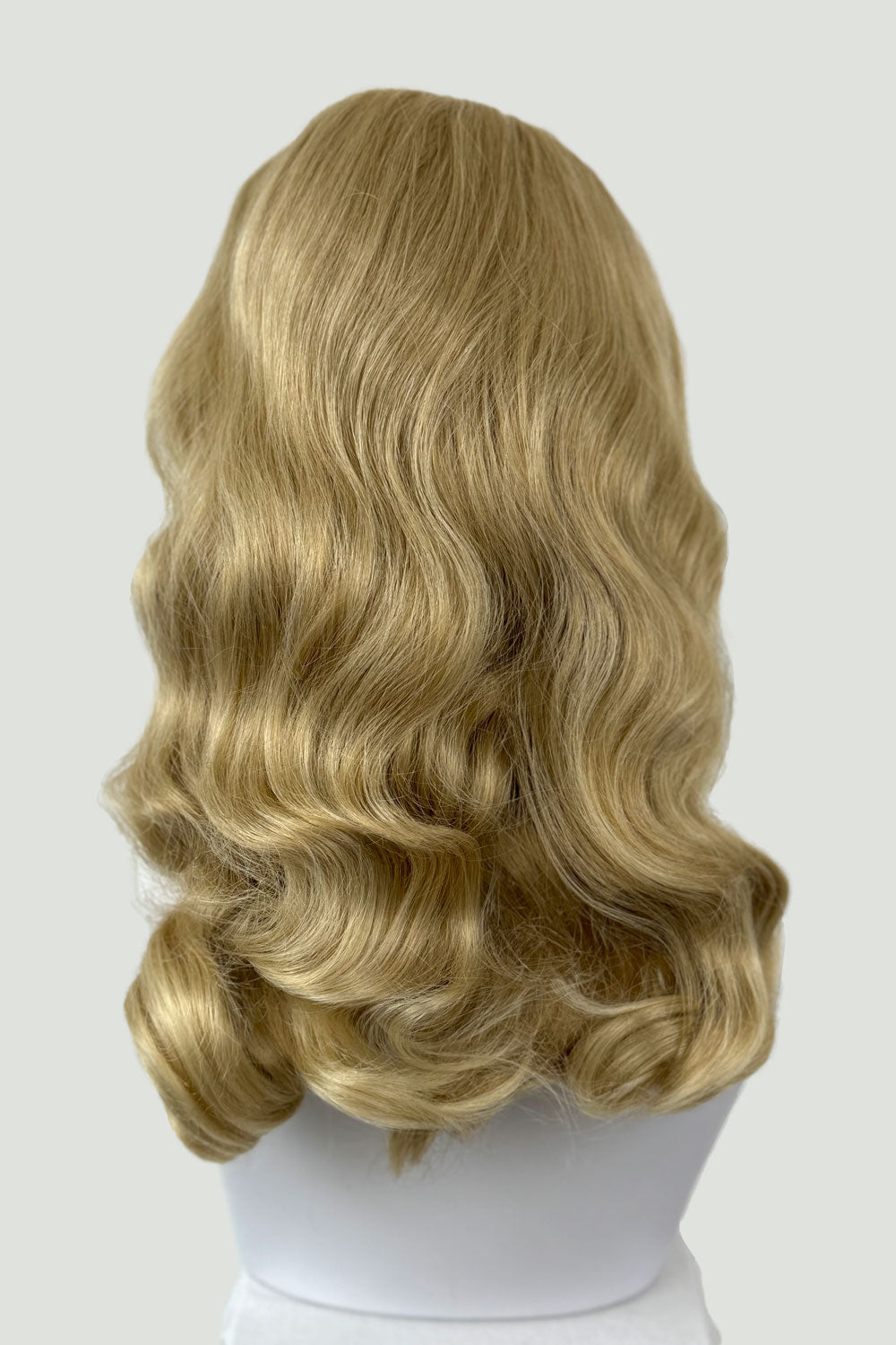 1950s style half wig hairpiece with beautiful waves: Morgana blonde 613T24