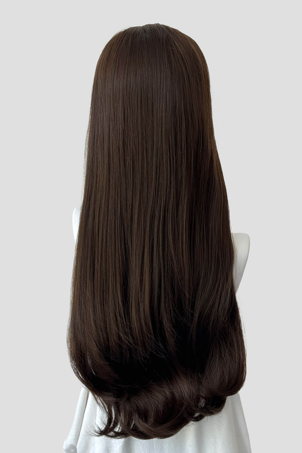 Long brown wig on a mannequin head against a white background. Kate - Heat Styleable Extra Long, Gentle Wave Half Wig  Chestnut brown 8
