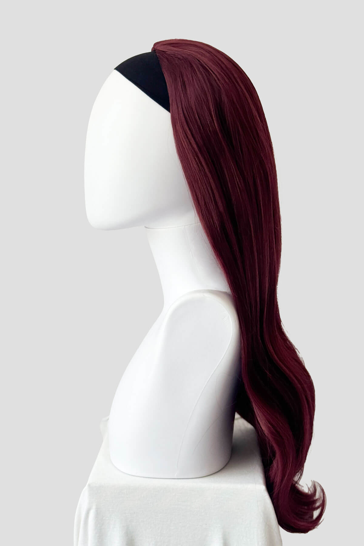 Mannequin head with red wig on a white background. Kate - Heat Styleable Extra Long, Gentle Wave Half Wig  red 39