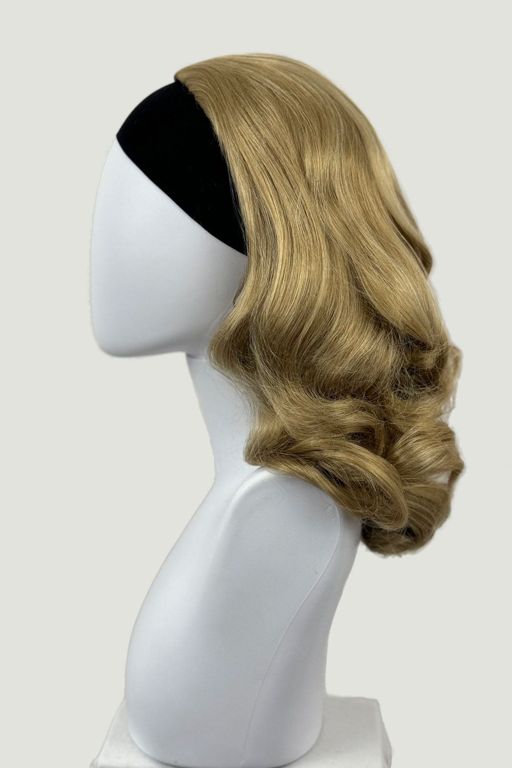 1950s style shoulder length half wig hairpiece with beautiful vintage waves: Onyx blonde 24H613 from the side