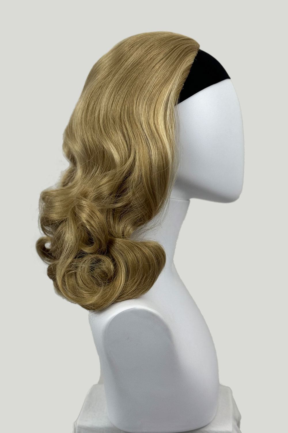 1950s style shoulder length half wig hairpiece with beautiful vintage waves: Onyx blonde 24H613 from the side