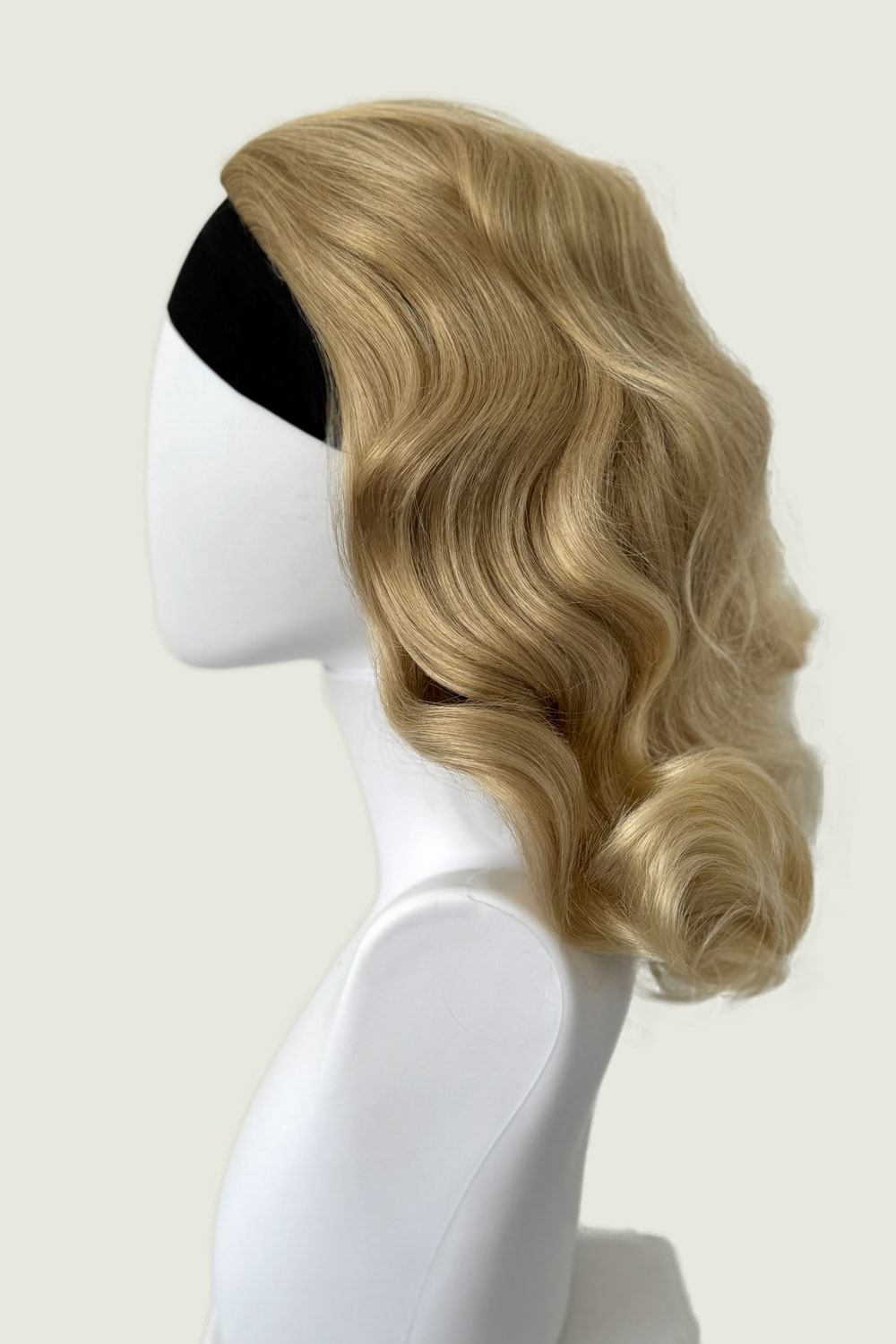 1950s style shoulder length half wig hairpiece with beautiful vintage waves: Onyx blond 613T24 from the side