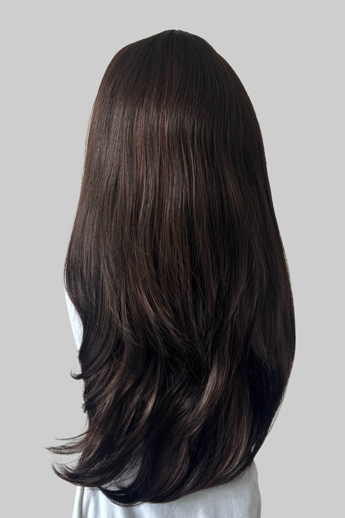 A long dark reddish brown half wig, displayed on a mannequin against a light grey background. Claudia - Volume Boosting Long Gentle Bouncy Layered Half wig dark reddish brown 6-33