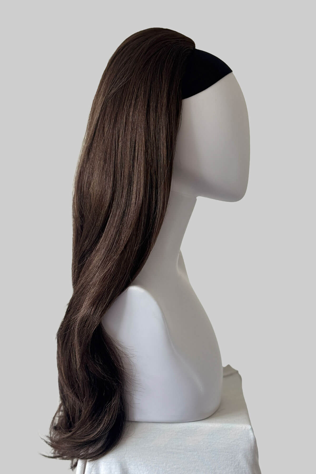 A long chestnut brown half wig, displayed on a mannequin against a light grey background. Claudia - Volume Boosting Long Gentle Bouncy Layered Half wig chestnut brown 8