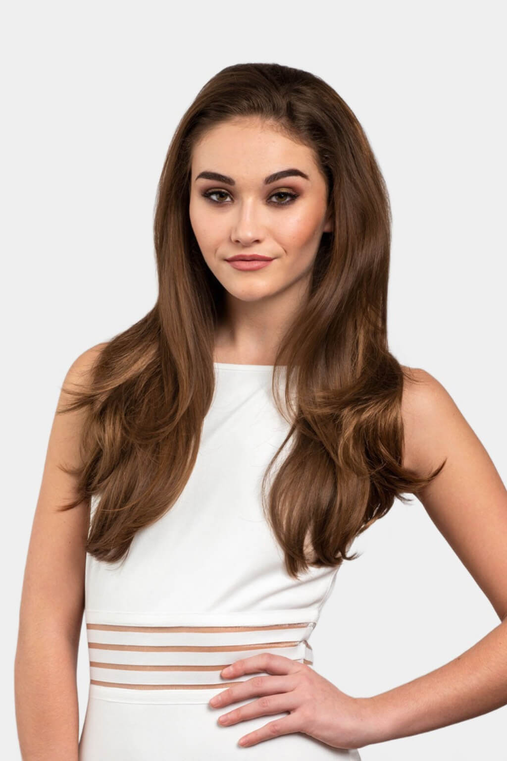 Woman with long brown hair. Brown half wig hairpiece gently layered: Briar light brown 12