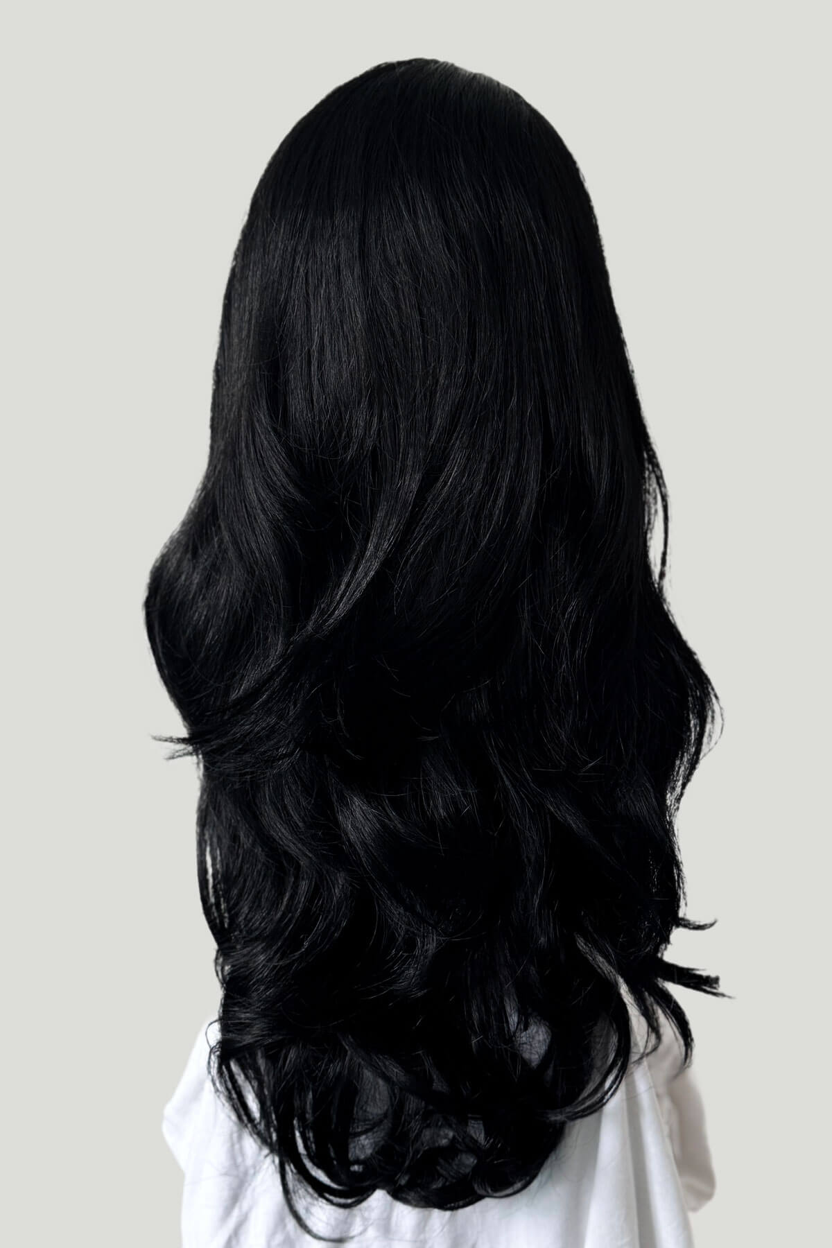 Black wig on a plain background.  Black 3/4 hairpiece (half wig) with long waves: Jessie jet black 1