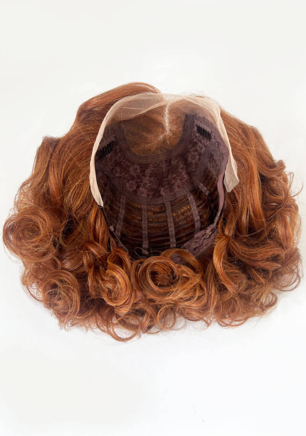 Auburn wig with curly hair on a white background. Auburn pinup wig, lace front, vintage style: Clementine