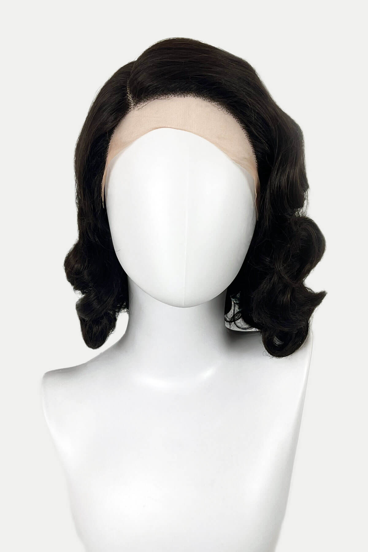 Black wig on a mannequin head against a white background. Brown lacefront wig, pinup/vintage style, mid length with finger waves: Hattie