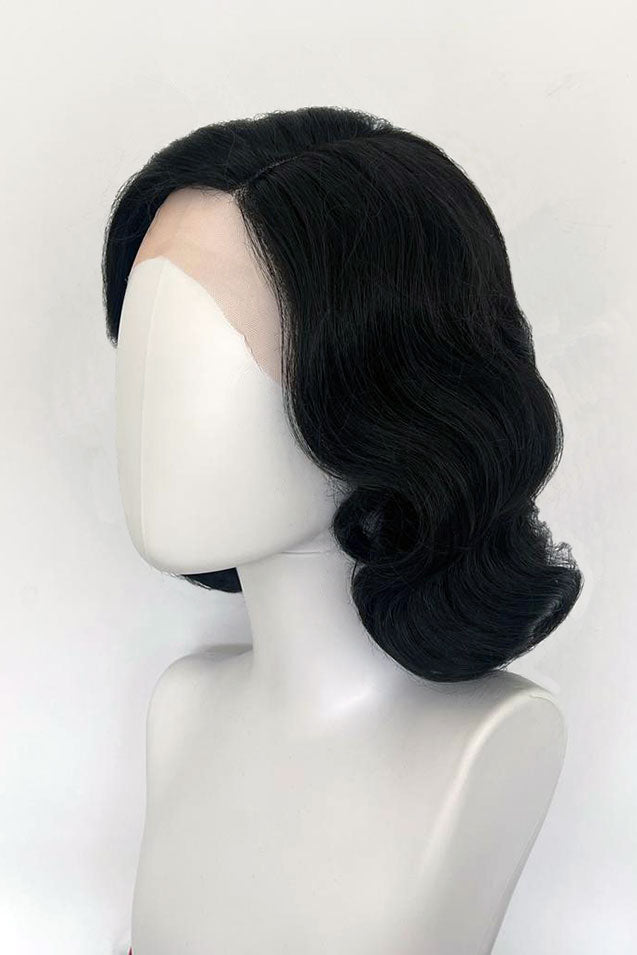 Black lacefront wig, pinup/vintage style, mid length with finger waves: Lilith black 1B gothic pictured from side