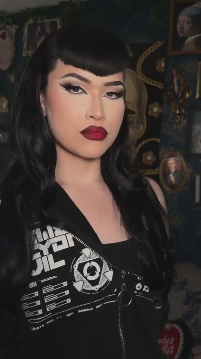 Womna with long black hair. Black half wig hairpiece (3/4 wig), long layers: Aislynn jet black #1