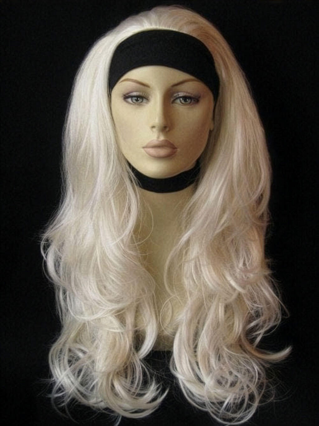 Mannequin head with long blonde wig and black headband on a black background. Annabelle's Wigs synthetic wig Platinum blonde half wig hairpiece (3/4 wig), wavy: Barbie