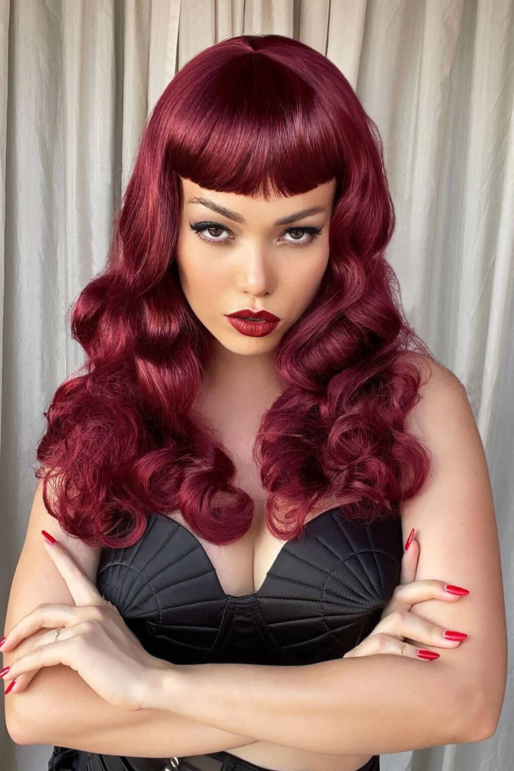 Long cherry red pin-up wig, gently wavy with short fringe: Maeve