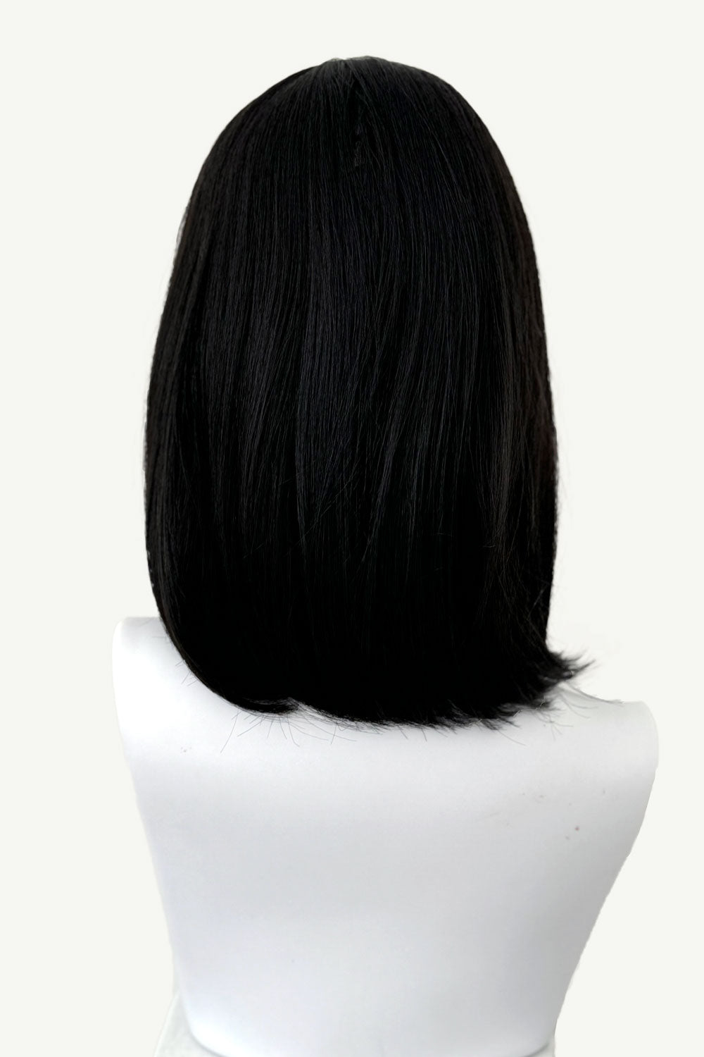 Black long bob wig with a short retro, rockabilly-style fringe: Beth