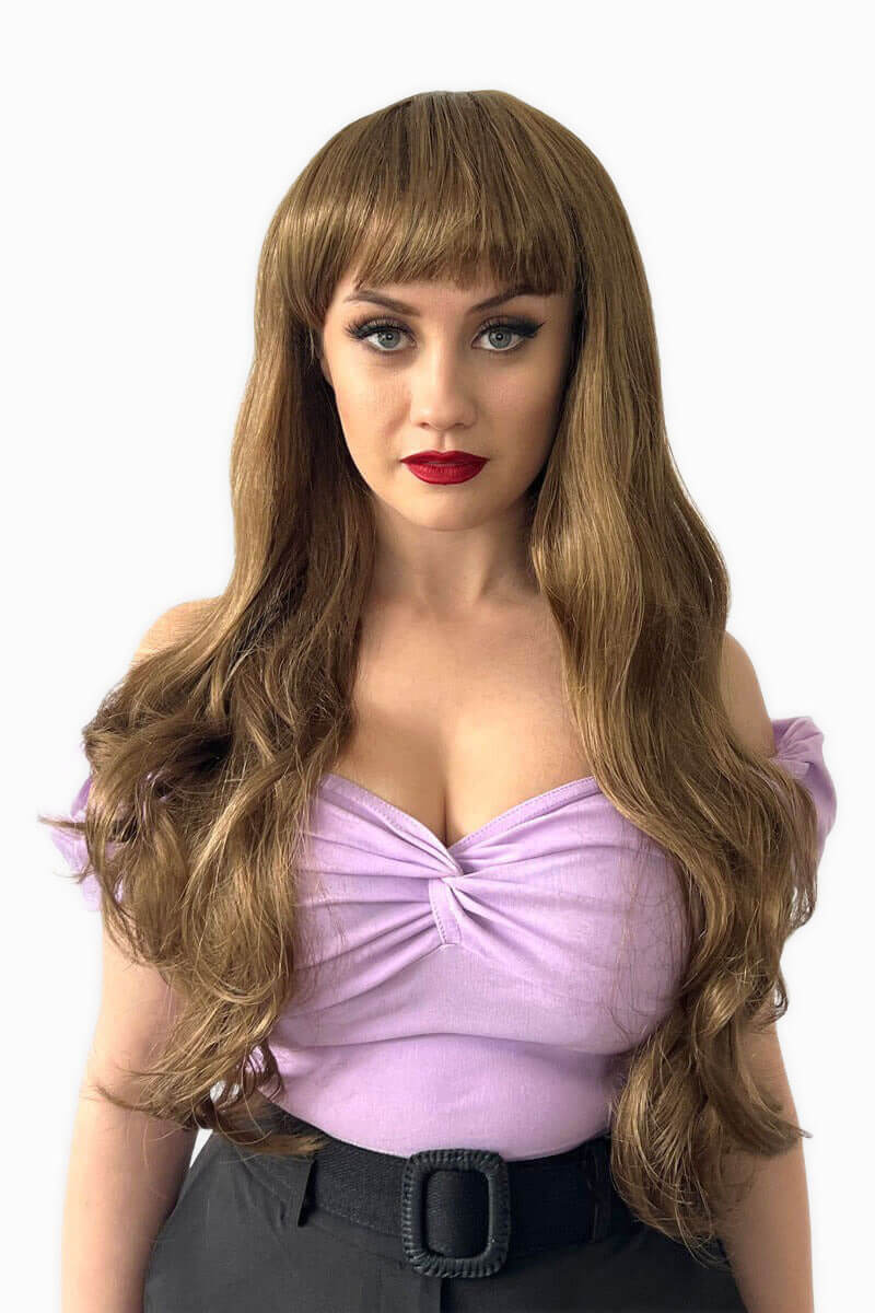 Long wavy light brown wig with vintage-style straight fringe: Maya