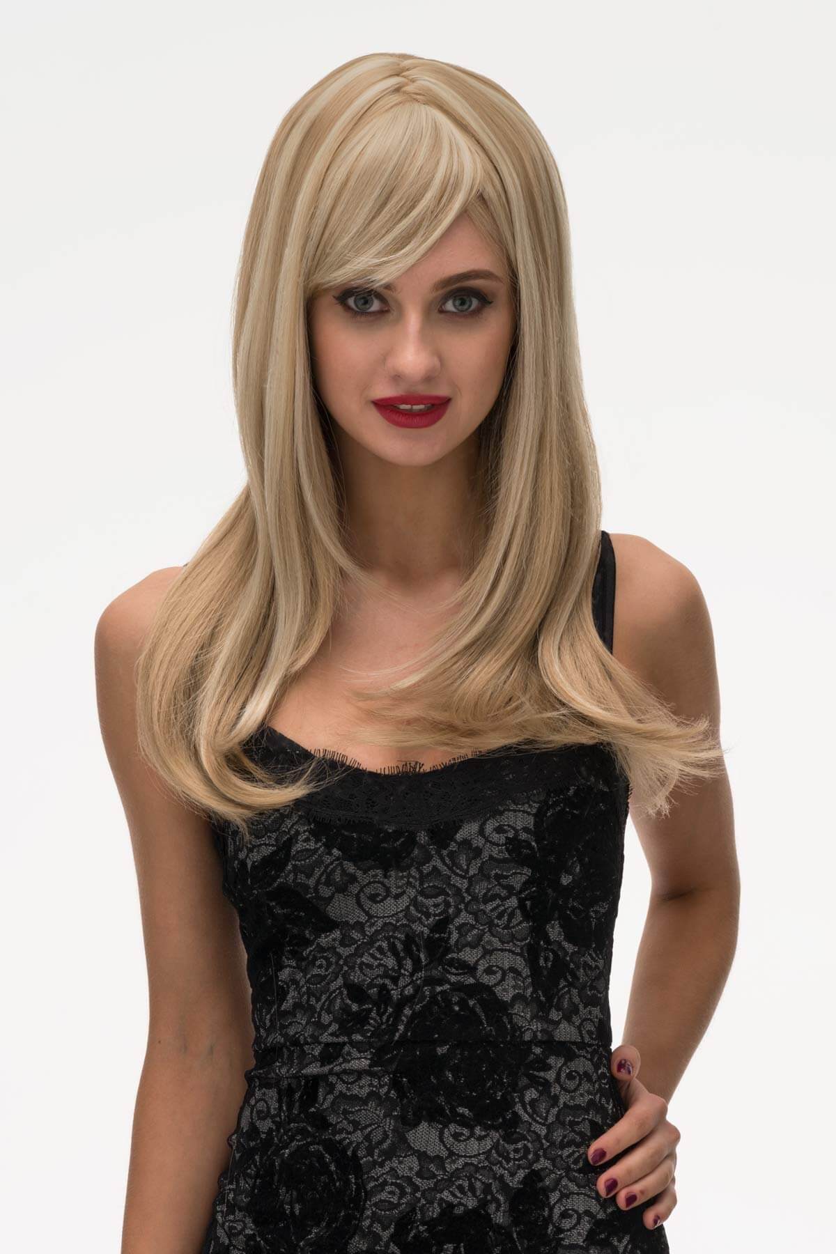 Woman wearing a blonde wig with a black lace dress on a white background. Long blonde wig, face framing with long, side-sweeping fringe: Ashley