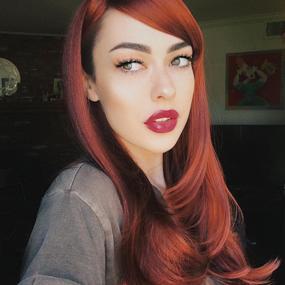 Long copper red wig, razor cut, face frame style: Eleanor AnnabellesWigs