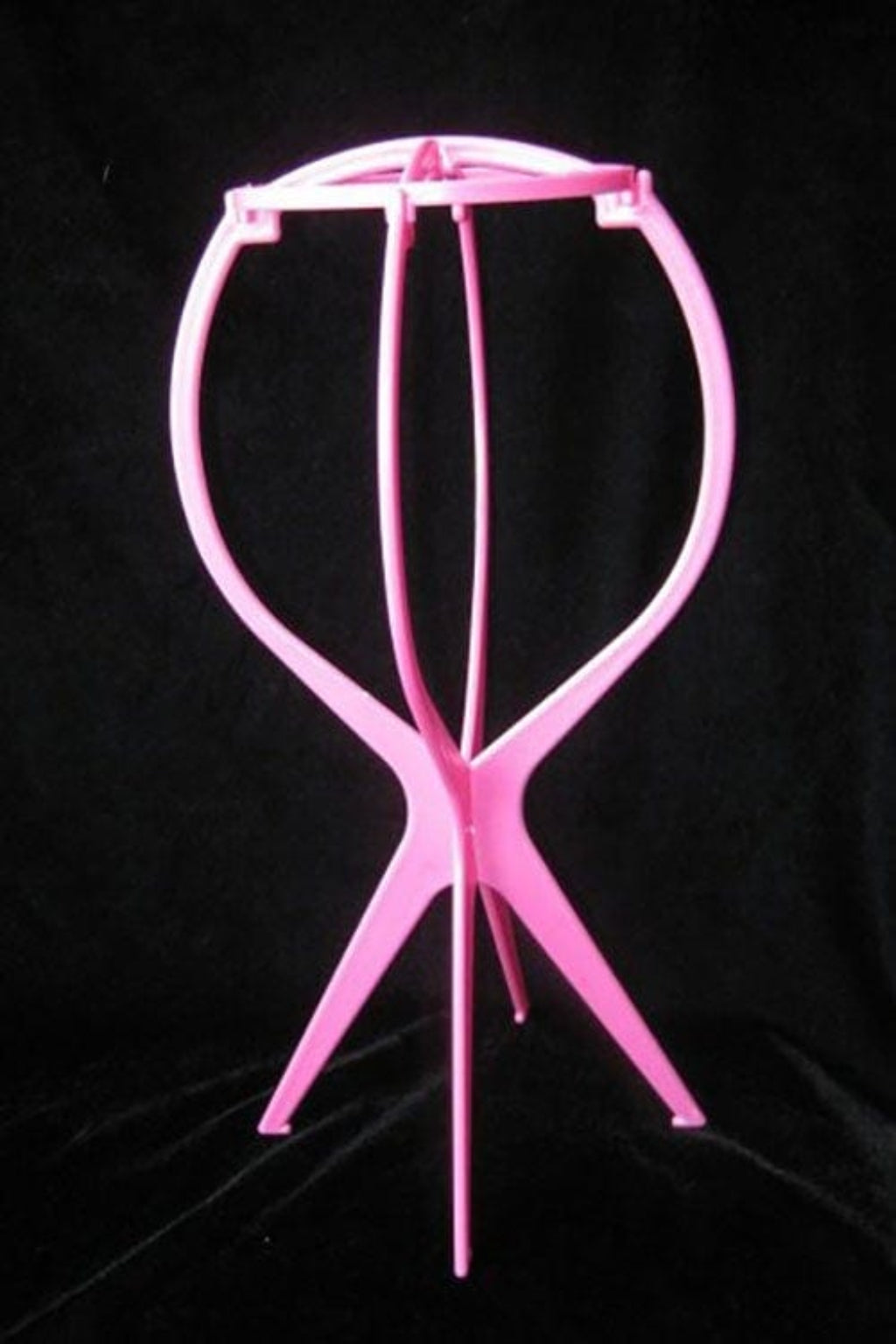 A collapsable wig stand - pink
