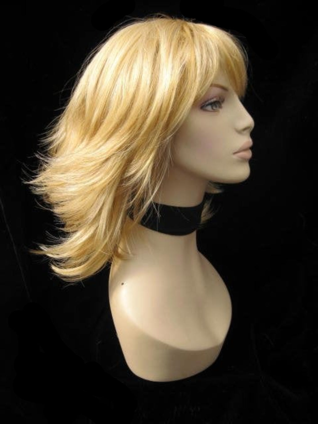 Annabelle's Wigs synthetic wig Warm blonde wig with flicked tips: Mary